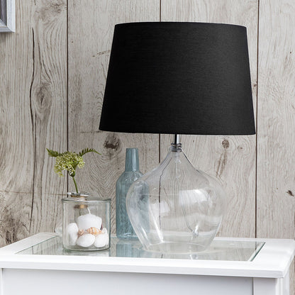 Table Lamp With Transparent Glass Base And Black Drum Shade
