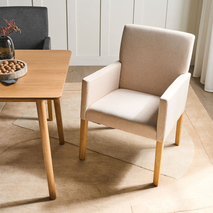 Beige Upholstered Dining Chair With Arms And Wooden Legs