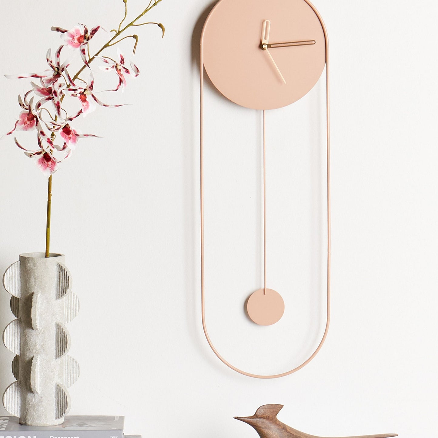 Pink Wall Clock No Numerals 20 x 62cm Oval Pendulum