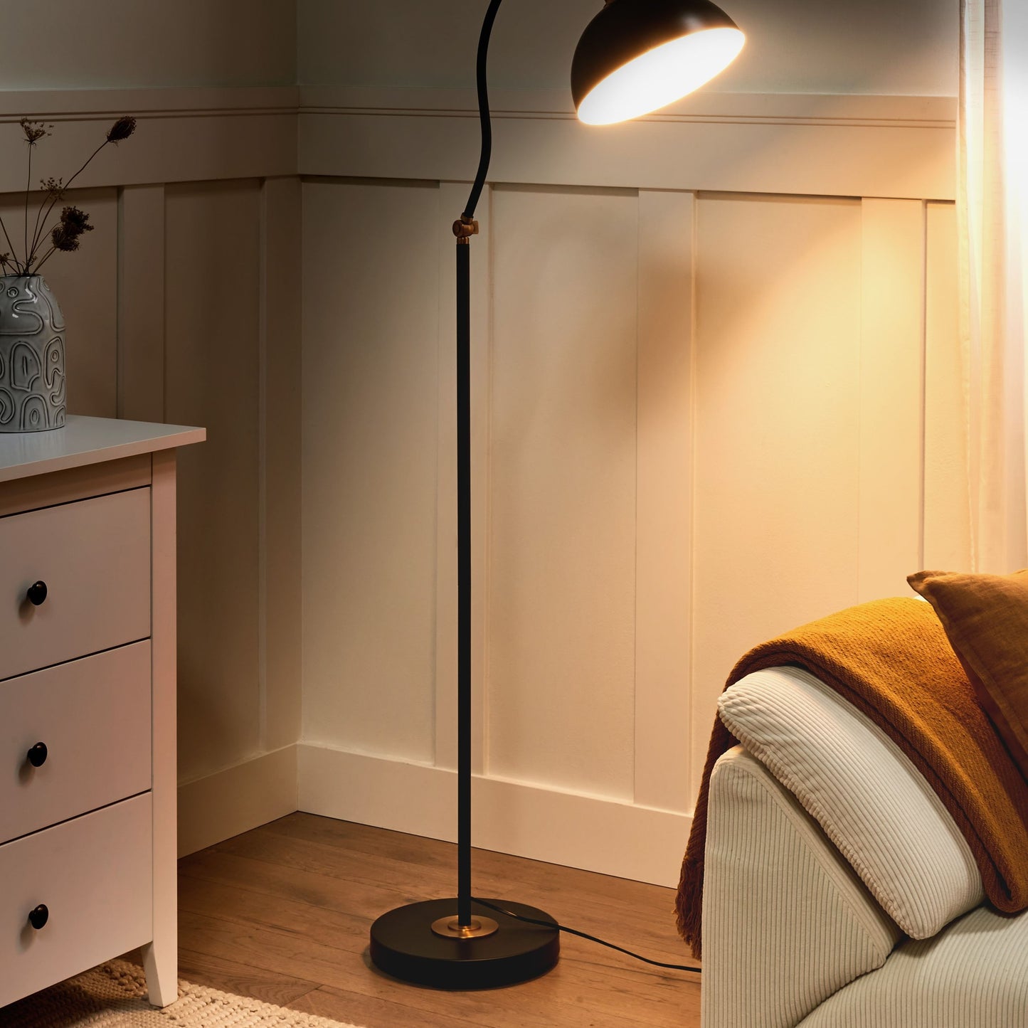 Black Metal Floor Lamp With Adjustable Shade And Arm Switch