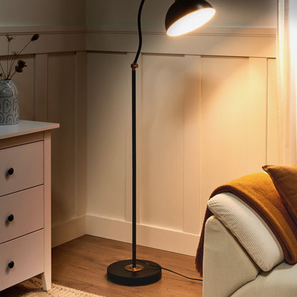 Black Metal Floor Lamp With Adjustable Shade And Arm Switch