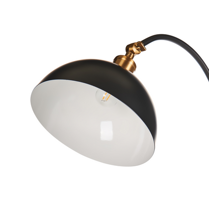 Black Metal Floor Lamp With Adjustable Shade And Arm Switch